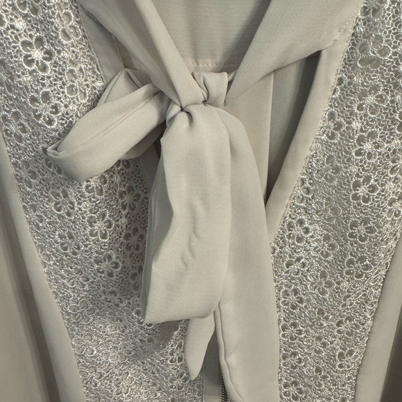 Tie Neck Blouse with Floral Embroidered Detail in the color Smoke - Picture 4 of 7